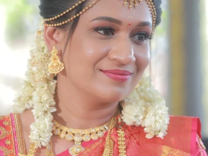Traditional Indian bride wearing elegant bridal makeup and bridal jewelry.